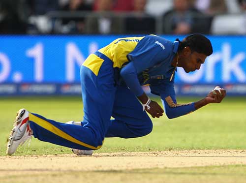 Isuru Udana grabs a sharp caught-and-bowled to remove Michael Clarke
