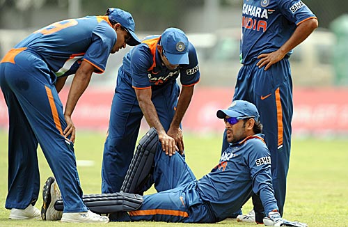 MS Dhoni survived a momentary scare after twisting his ankle