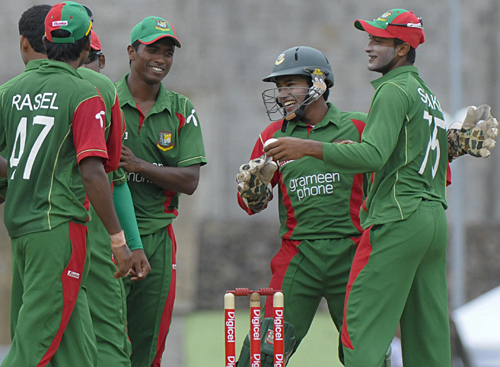 Shakib Al Hasan and team-mates celebrate another West Indian run-out