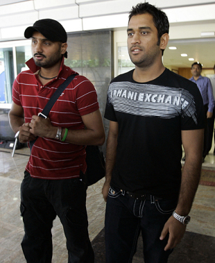 Harbhajan Singh and MS Dhoni Mahendra Singh Dhoni leave the BCCI head office after a meeting with ICC officials, Mumbai, August 2, 2009
