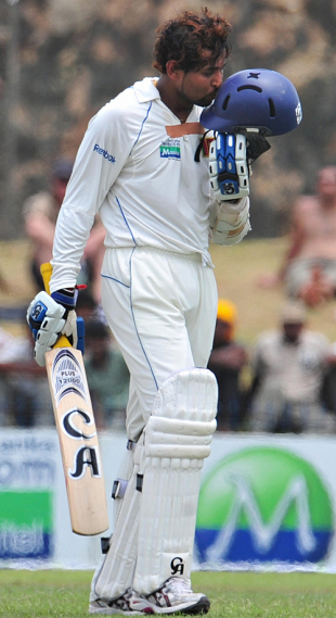 Tillakaratne Dilshan kisses his helmet on getting to his half-century, Sri Lanka v New Zealand, 1st Test, Galle, 1st day, August 18, 2009
