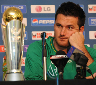 Graeme Smith glances at the Champions Trophy during a press conference, Potchefstroom, September 17, 2009