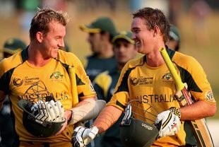 Nathan Hauritz and Brett Lee scampered a bye off the last ball against Pakistan to take Australia to the top of Group A