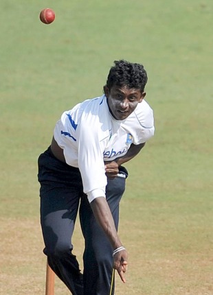 Ajantha Mendis has a bowl during a practice session on the eve of the third Test, Mumbai, December 1, 2009