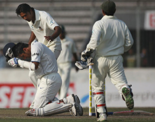 Shahadat Hossain checks on Rahul Dravid after felling him with a  bouncer, Bangladesh v India, 2nd Test, Mirpur, 2nd day, January 25,  2010