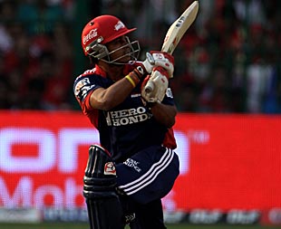 Kedar Jadhav scored a sparkling half-century on his IPL debut to help Delhi Daredevils beat Royal Challengers Bangalore by 17 runs