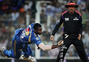 Kieron Pollard starred with an all-round effort, scoring a quick 33, taking three wickets and effecting a run-out to take Mumbai Indians to the IPL final
