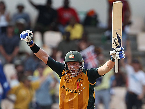 Michael Hussey  celebrates after the heist 
