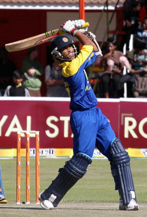 Dinesh Chandimal clobbers the ball over long-on