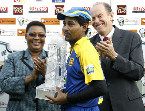 Winning captain Tillakaratne Dilshan collects the trophy