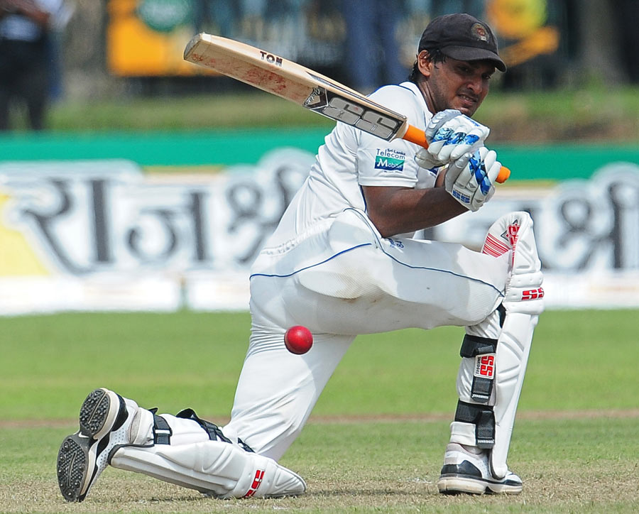 Kumar Sangakkara sweeps the ball