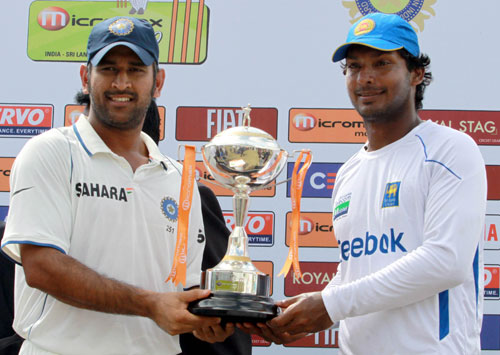 MS Dhoni and Kumar Sangakkara pose with the series trophy