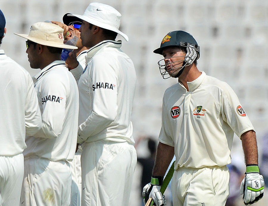 Ricky Ponting exchanges words with India's fielders after his dismissal