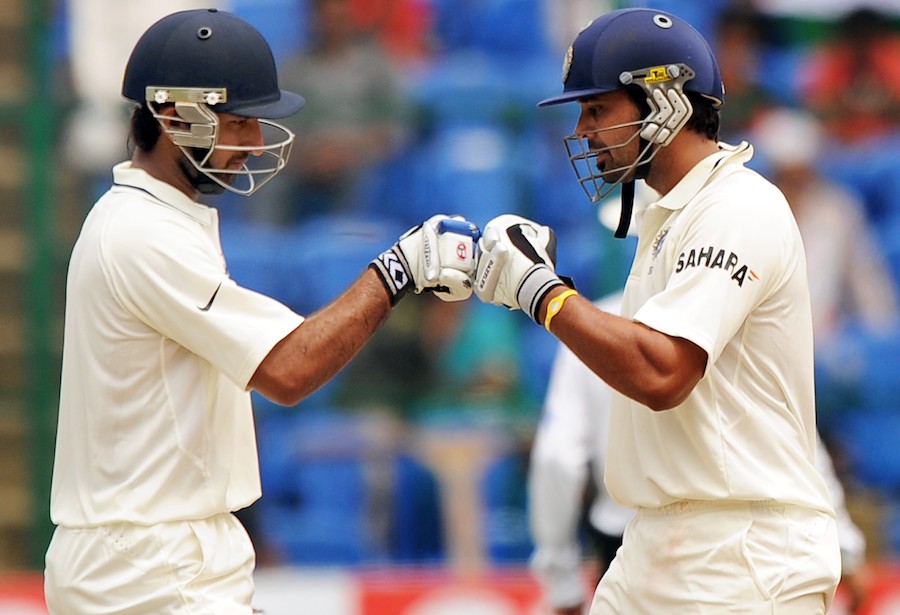 M Vijay and Cheteshwar Pujara punch gloves during their partnership