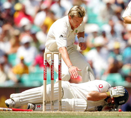 Despite the padding and protection, a ball made of cork covered in leather and lacquer, weighing 156g and travelling at 100mph will fell a batsman. Here Brett Lee checks out his latest victim. 