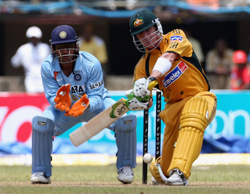 Brad Haddin prepares to launch into the ball during his unbeaten 87