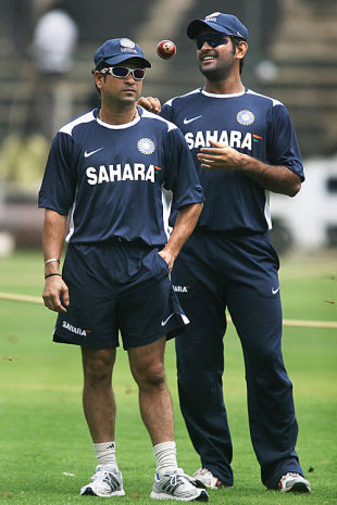 Sachin Tendulkar and Mahendra Singh Dhoni look on during a practice session, Bangalore, September 29, 2008